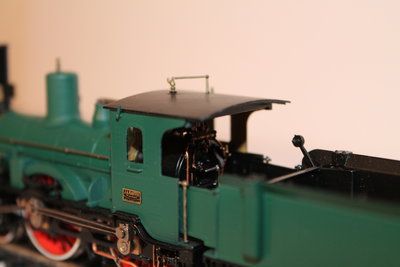 Кабина локомотива, модель окрашена Юрием Меркутовым, изначальна модель была серо-голубого цвета. Заводская табличка куплена специально через интернет