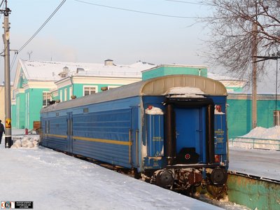 Багажный вагон на разгрузке, ст. Кемерово, Кемеровская обл.<br />Автор: Сергачёв Андрей | Фото сделано 23.XII.2008