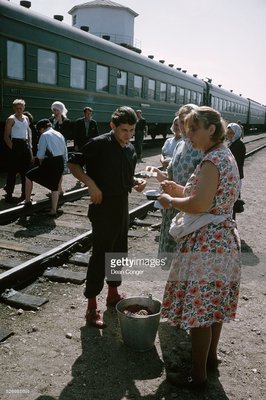 Trans-Siberian Railroad Passenger Buys Cranberries During a Station Stop (Photo by Dean Conger/Corbis via Getty Images)